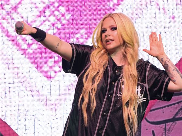 Review: Avril Lavigne takes fans back to their teen years at Star