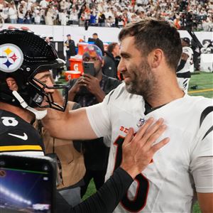 Pittsburgh Steelers quarterback Aaron Rodgers (8) and Cincinnati Bengals quarterback Joe Flacco, right, meet on the field following an NFL football game in Cincinnati, Thursday, Oct. 16, 2025. 