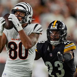 Cincinnati Bengals wide receiver Andrei Iosivas (80) pulls in a pass as Pittsburgh Steelers cornerback Darius Slay (23) defends during an NFL football game, Thursday, Oct. 16, 2025, in Cincinnati.