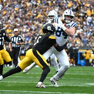 Steelers cornerback Jalen Ramsey (5) tackles Colts tight end Tyler Warren (84)  Steelers Colts game at Acrisure Stadium on Sunday Nov. 2, 2025.   
