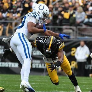 New Steelers safety Kyle Dugger (29) tackles Colts running back Jonathan Taylor (28) during the Steelers Colts game at Acrisure Stadium on Sunday Nov. 2, 2025.   