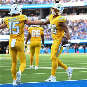 Los Angeles Chargers tight end Oronde Gadsden II (86) celebrates a touchdown with wide receiver Ladd McConkey (15) against the Indianapolis Colts during the second half of an NFL football game Sunday, Oct. 19, 2025, in Inglewood, Calif.