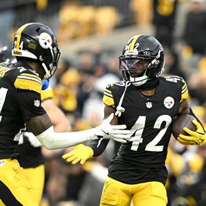 Steelers cornerbacks Joey Porter Jr. (24) and James Pierre celebrate Pierre’s fumble return for a touchdown against the Bengals at Acrisure Stadium Sunday Nov. 16, 2025. 