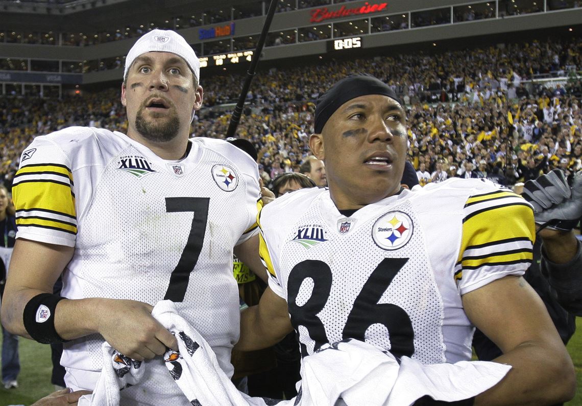 In this Feb. 1, 2009, file photo, Pittsburgh Steelers' Ben Roethlisberger, left, and Hines Ward stand on the field after the Steelers defeated the Arizona Cardinals 27-23 in NFL football's Super Bowl XLIII in Tampa, Fla.