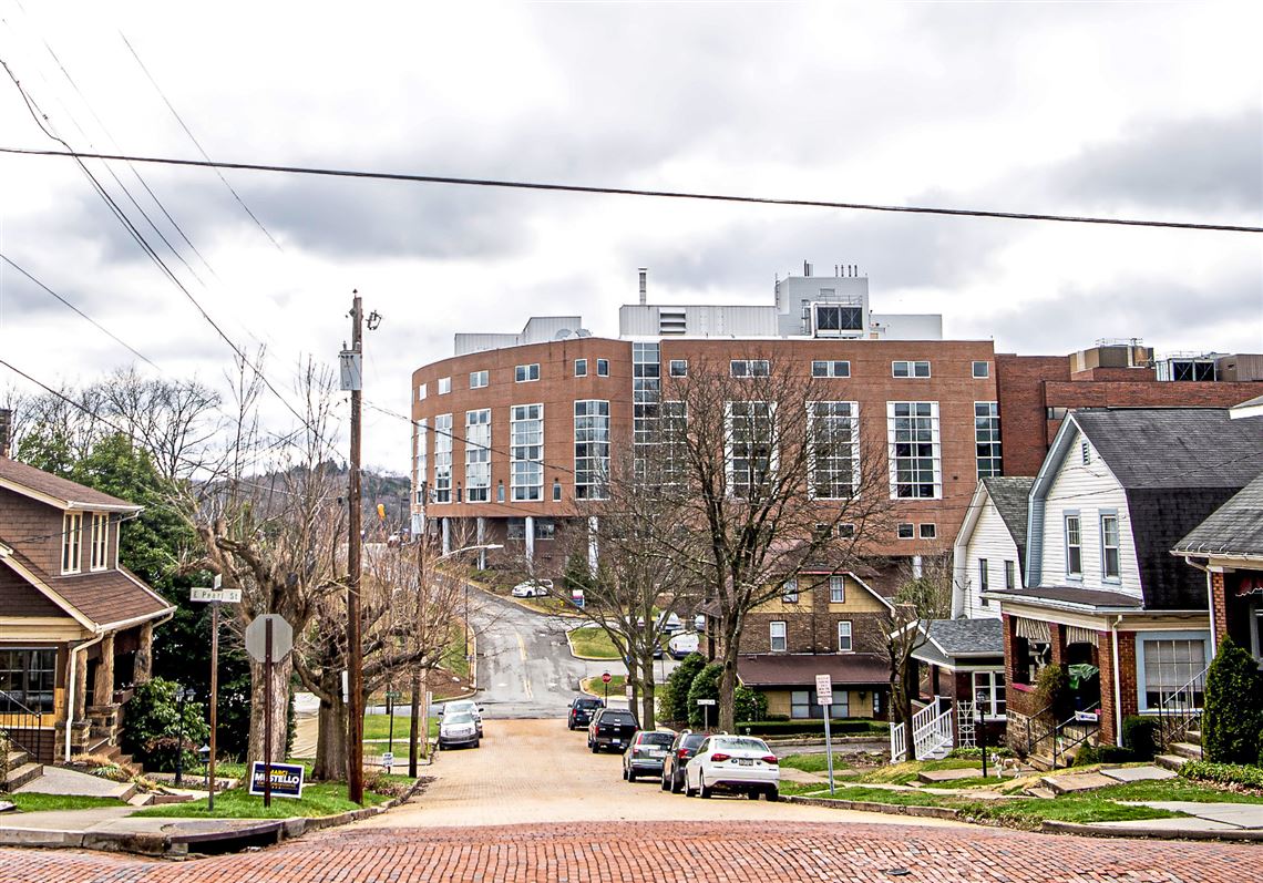 Independence Health System continues to trim operating losses, as it preps for tie up with WVU Medicine