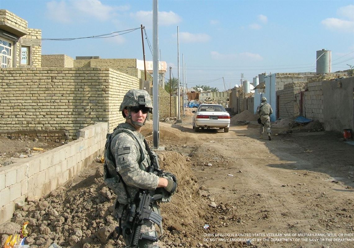 Chris Deluzio in body armor in Iraq during his deployment in 2009-10 with U.S. Army Civil Affairs.