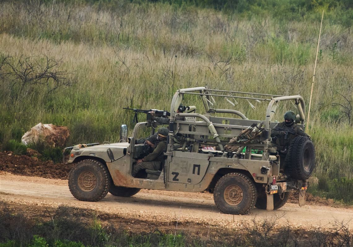 Israeli strike on village in eastern Lebanon kills 12, as Israel calls up more troops there