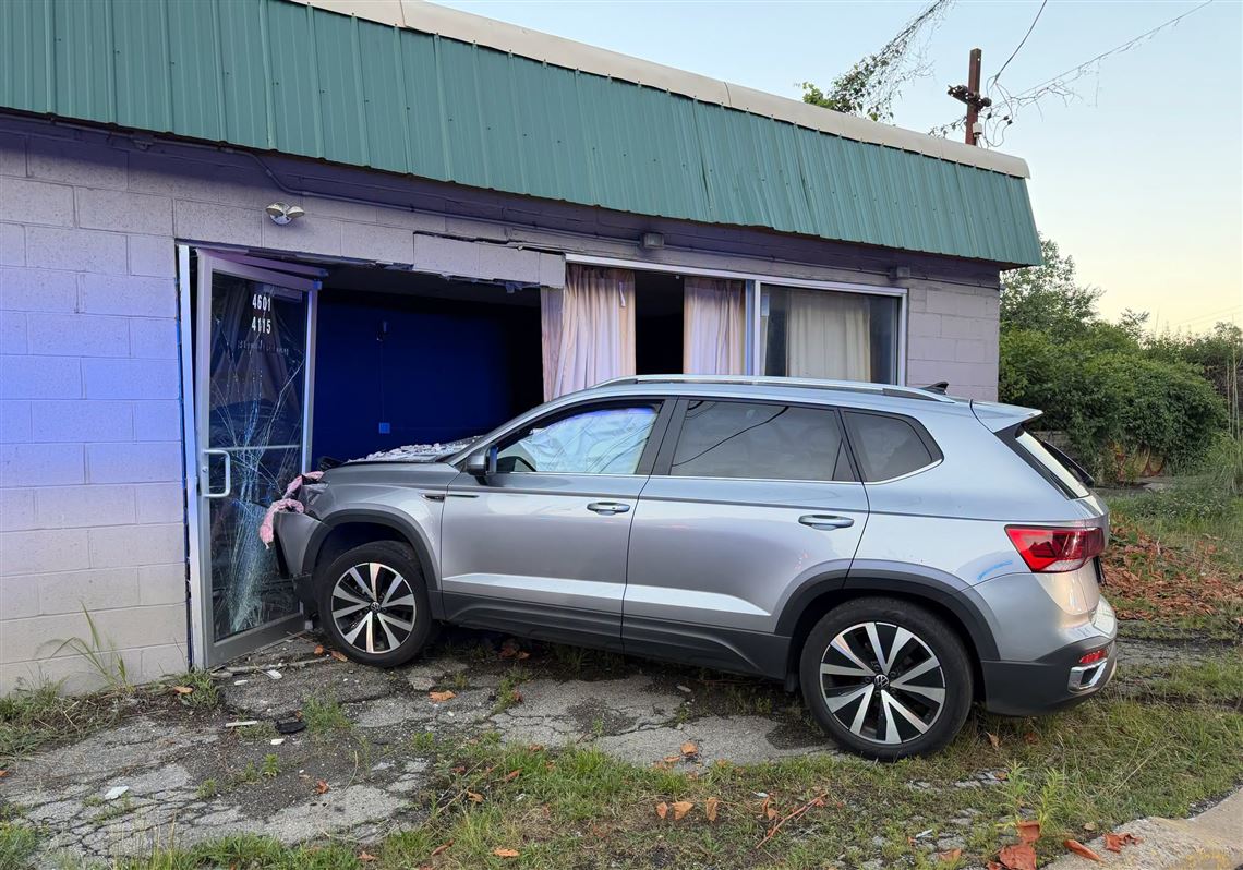 Driver fleeing from police crashes into South Side business