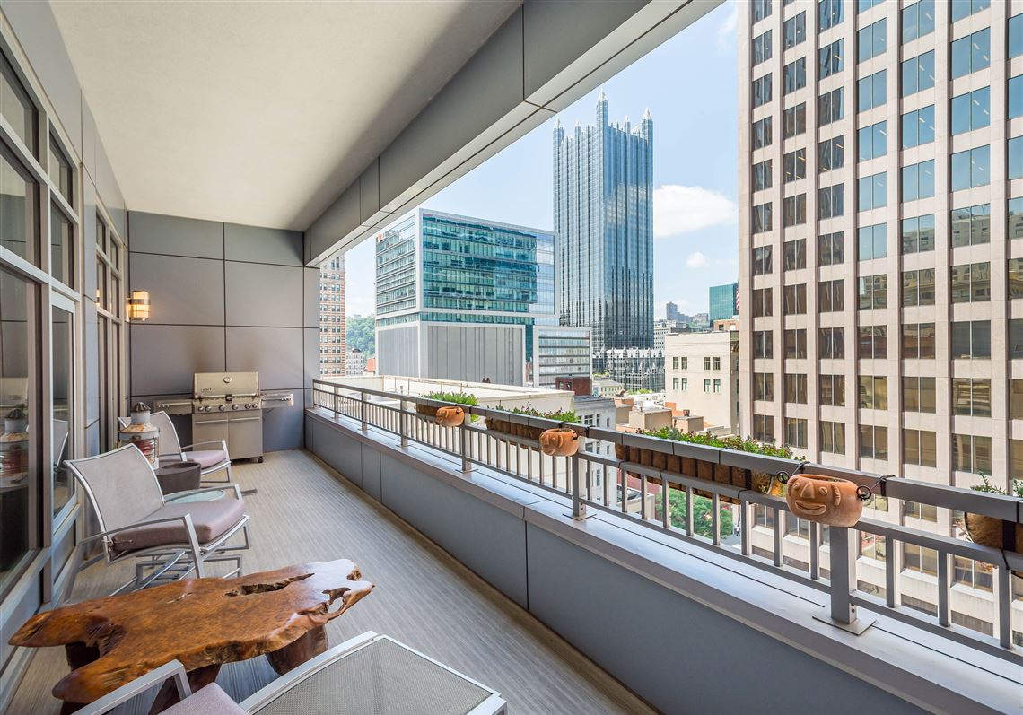 Buying Here: Downtown condo with a waterfall and terrace priced at $1.95M
