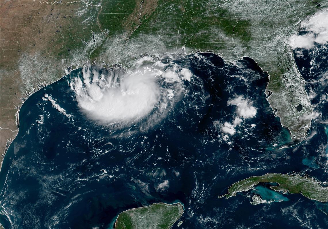 Tropical Storm Edouard heads for Texas and Louisiana while a storm moves toward Hawaii