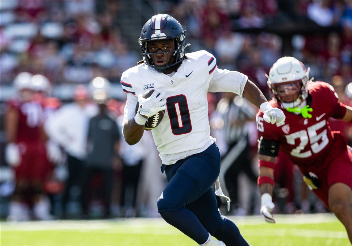 Duquesne's Dazhaun Hopkins emerges out of the backfield