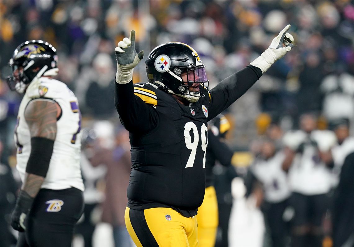 Pittsburgh Steelers defensive tackle Derrick Harmon (99) celebrates after defeating the Baltimore Ravens in an NFL football game, Sunday, Jan. 4, 2026, at Acrisure Stadium in Pittsburgh.
